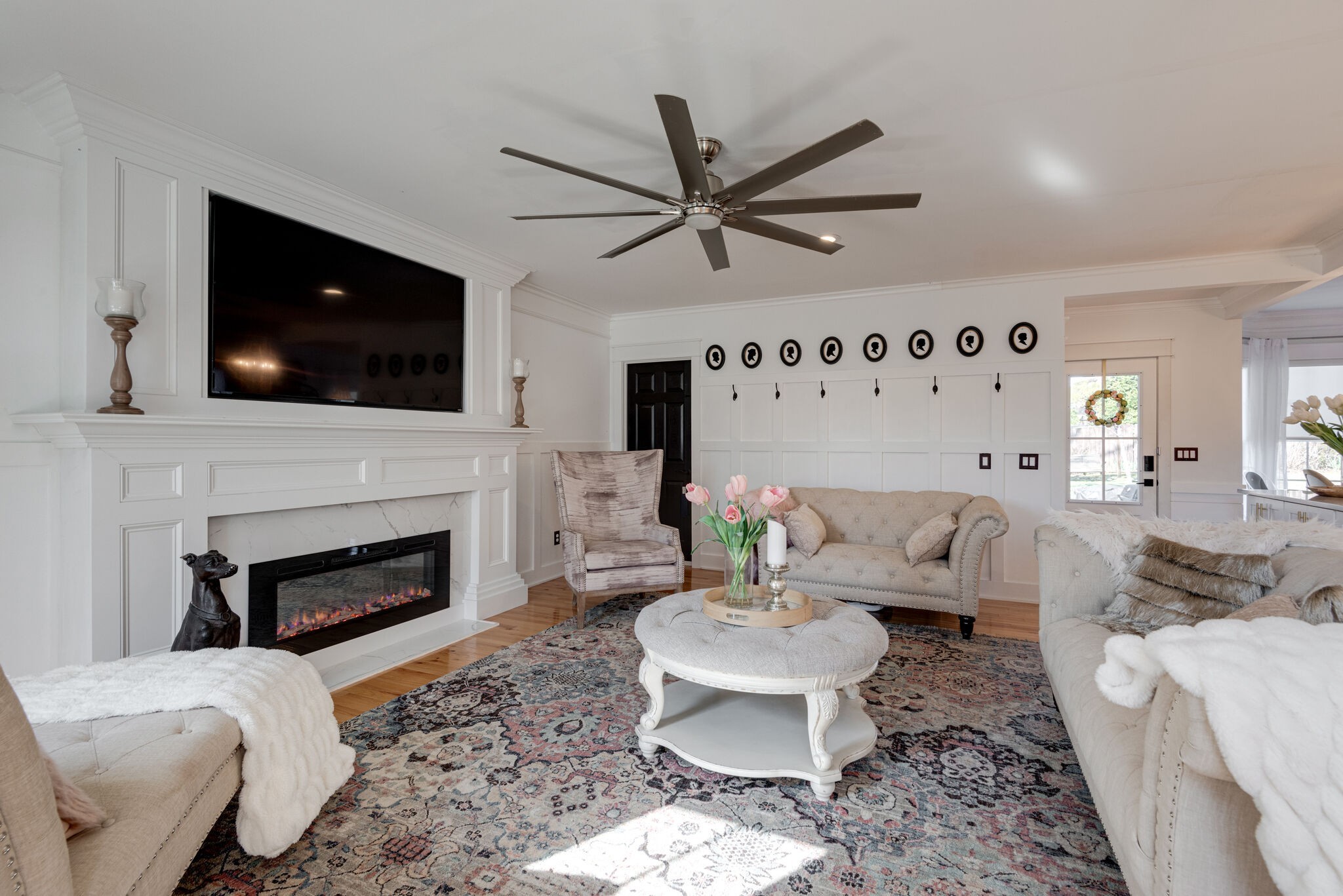 111 Meadowood Loop Burns, TN 37029 - Photo 13 of 73 a living room with furniture a fireplace and a flat screen tv
