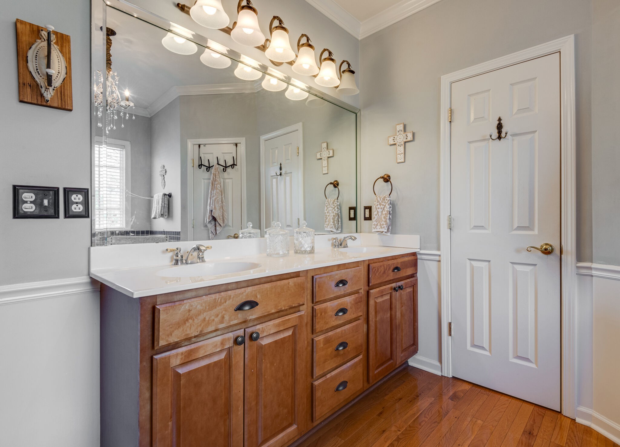 111 Meadowood Loop Burns, TN 37029 - Photo 28 of 73 a bathroom with a sink double vanity and a mirror