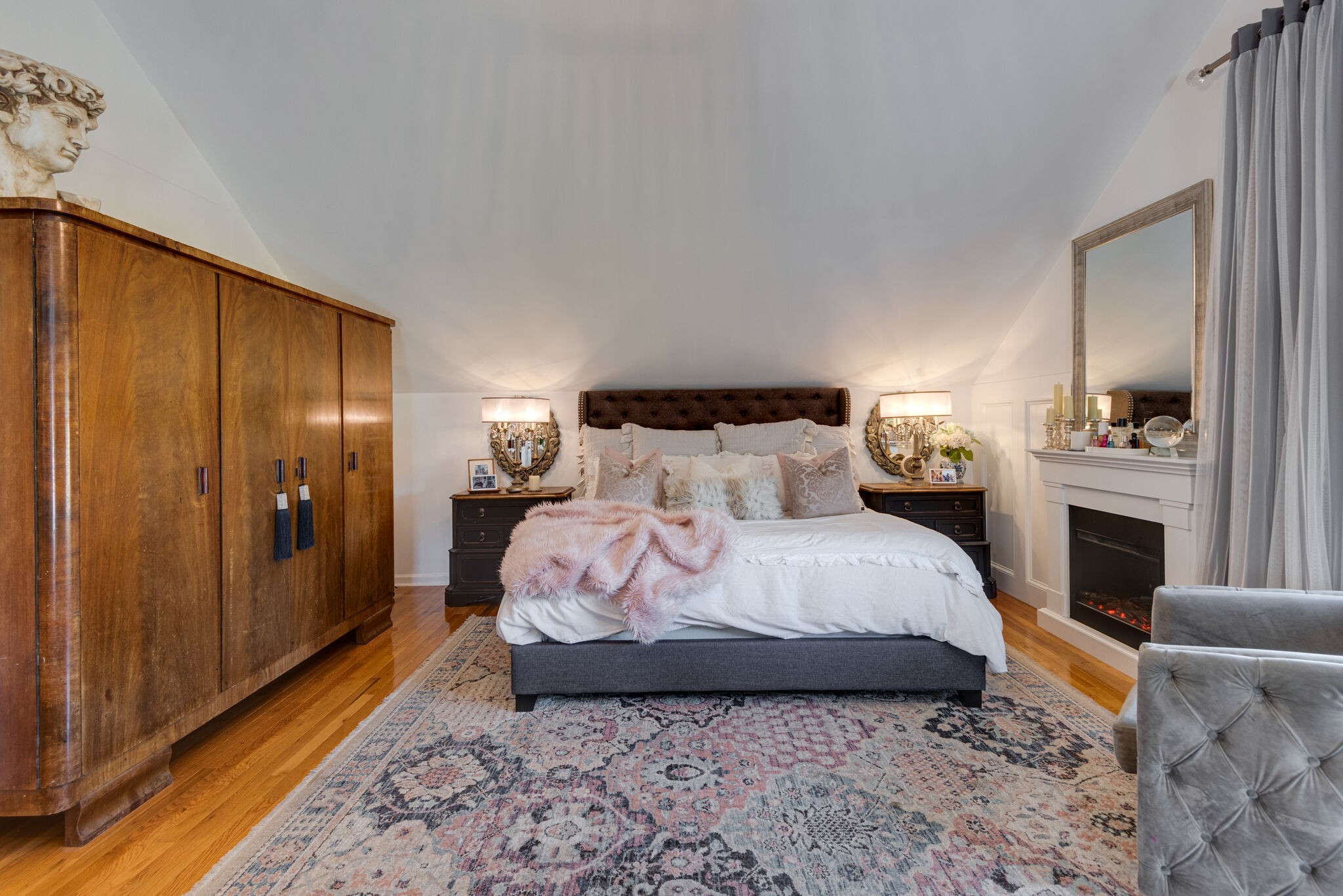 111 Meadowood Loop Burns, TN 37029 - Photo 29 of 73 a spacious bedroom with a bed and a dresser