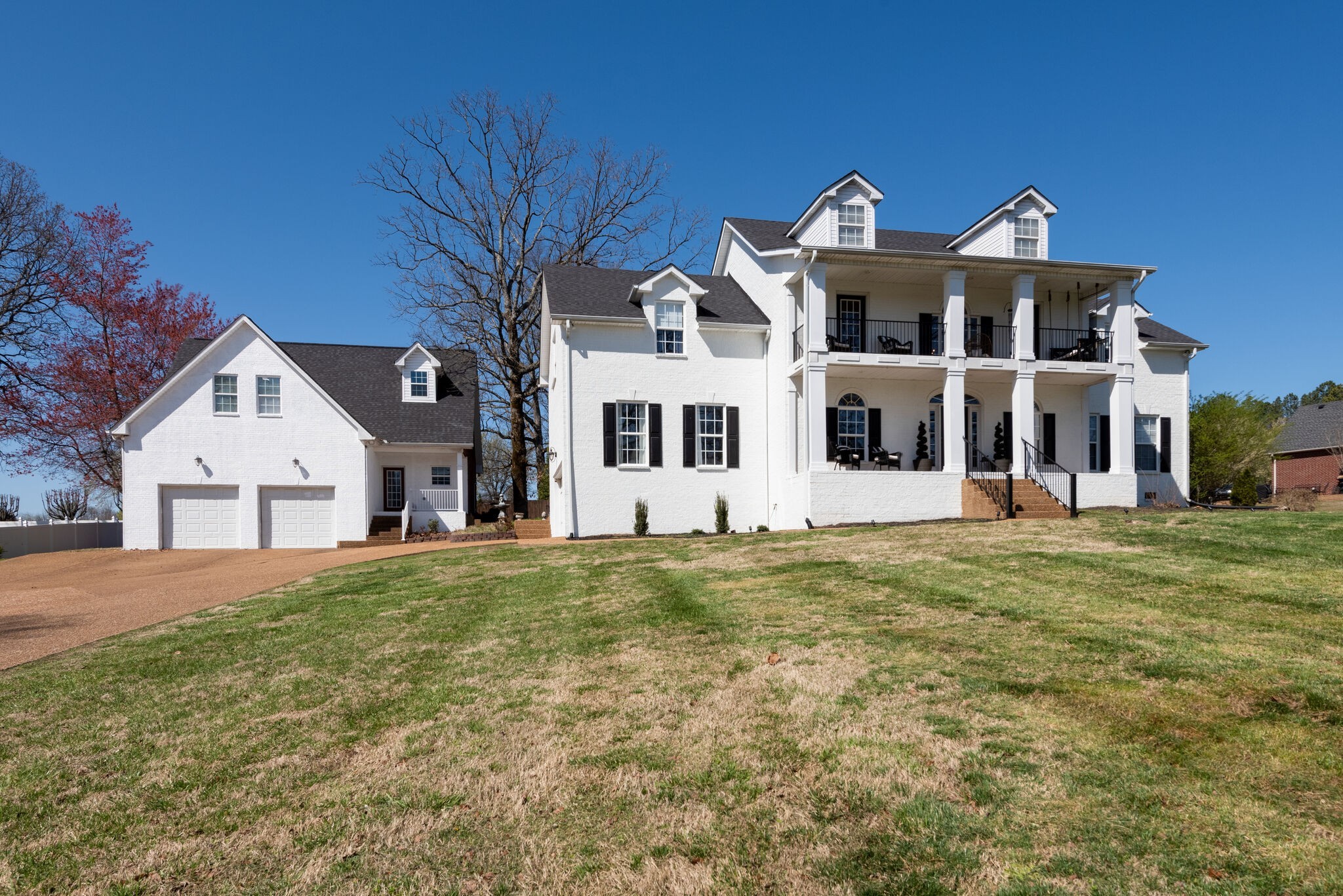 111 Meadowood Loop Burns, TN 37029 - Photo 3 of 73 a front view of a house with a yard