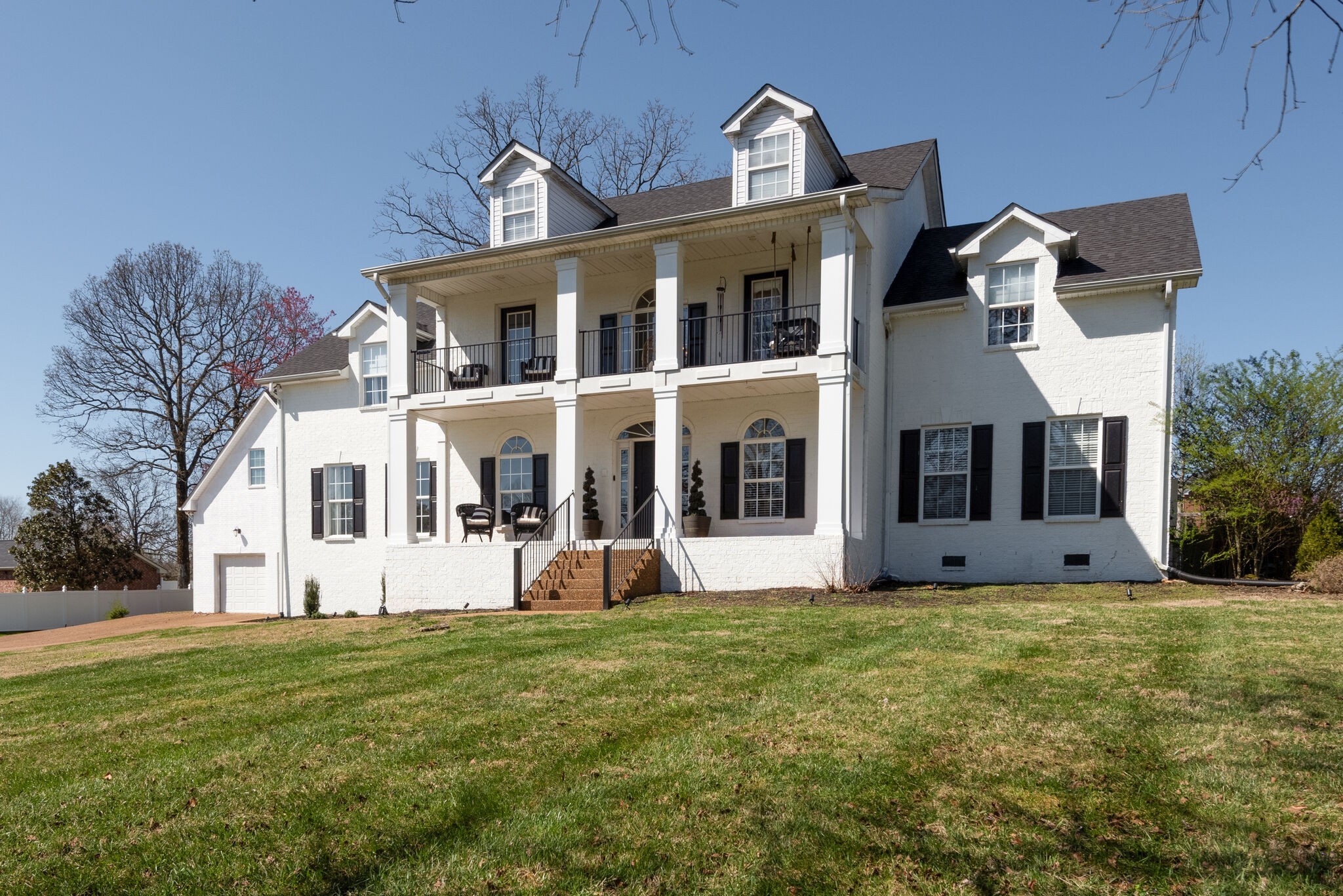 111 Meadowood Loop Burns, TN 37029 - Photo 4 of 73 a front view of a house with a yard