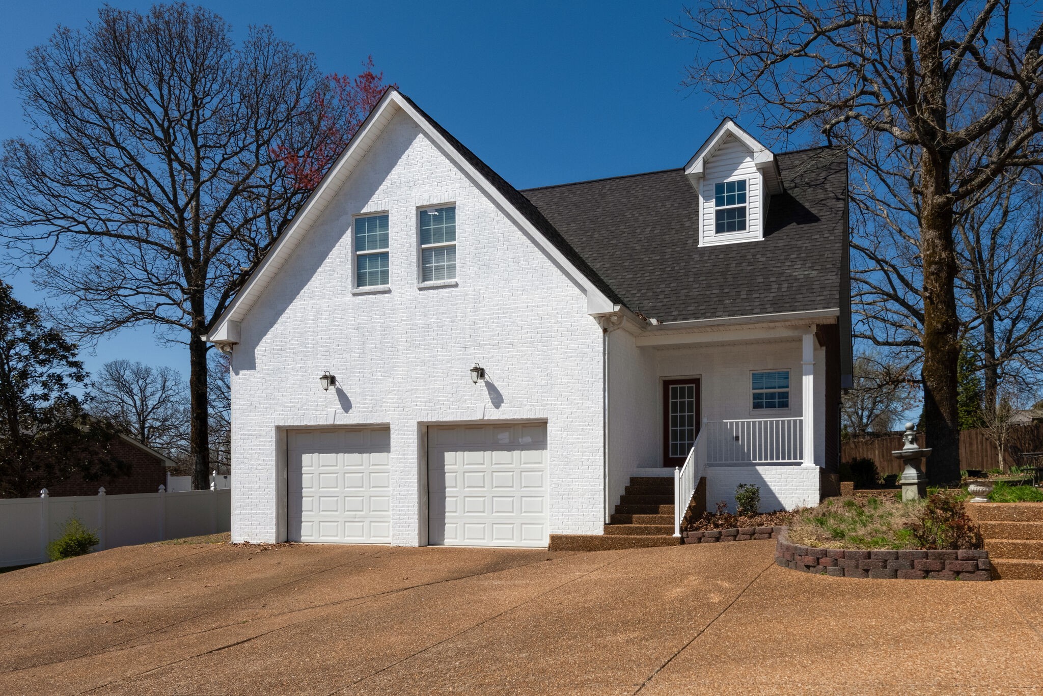 111 Meadowood Loop Burns, TN 37029 - Photo 43 of 73 a front view of a house with a garage