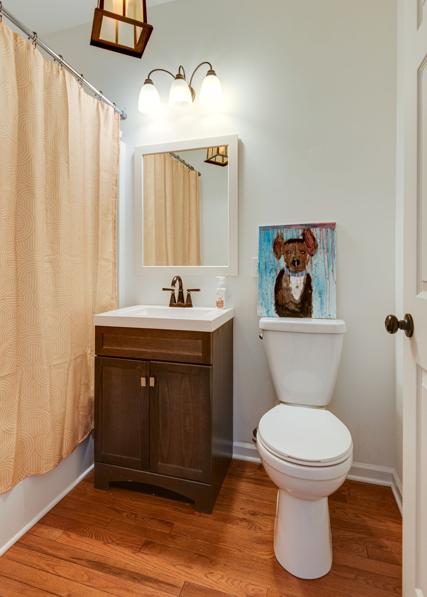 111 Meadowood Loop Burns, TN 37029 - Photo 51 of 73 a bathroom with a toilet sink and mirror