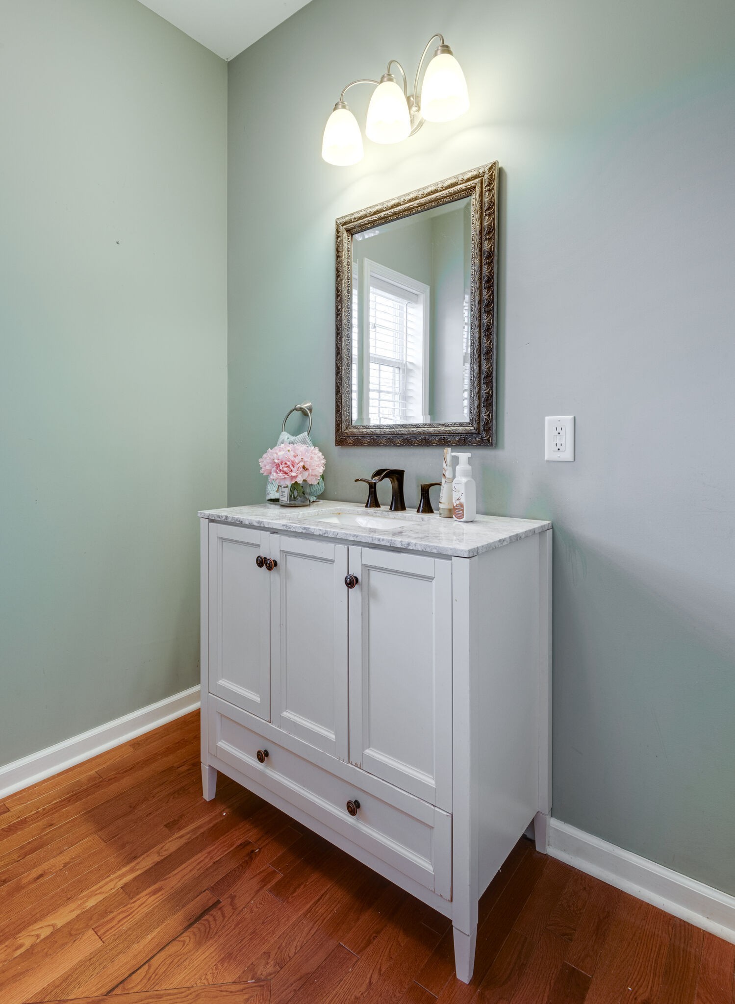 111 Meadowood Loop Burns, TN 37029 - Photo 52 of 73 a bathroom with a sink and a mirror
