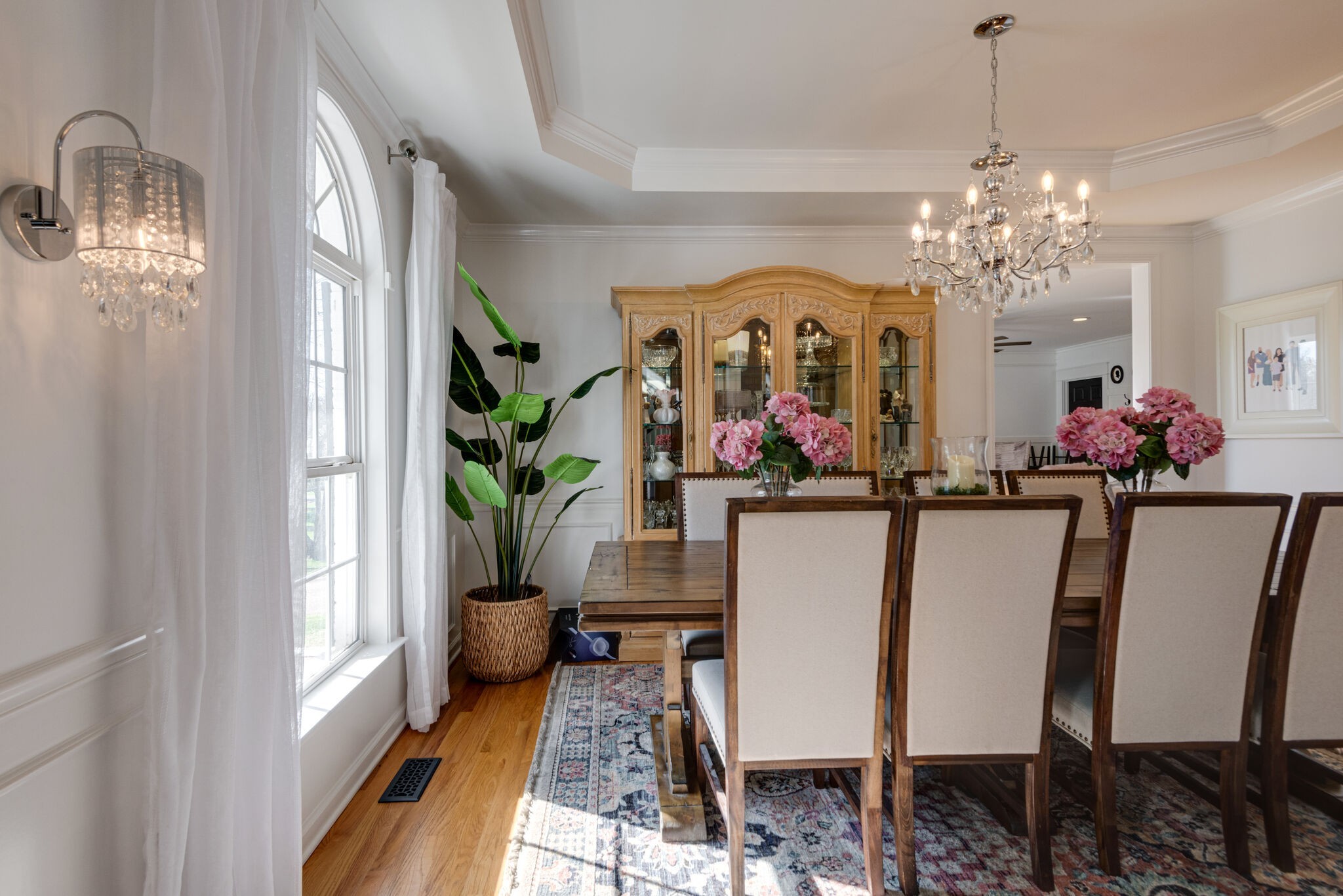 111 Meadowood Loop Burns, TN 37029 - Photo 10 of 73 a view of a dining room with furniture a chandelier and wooden floor