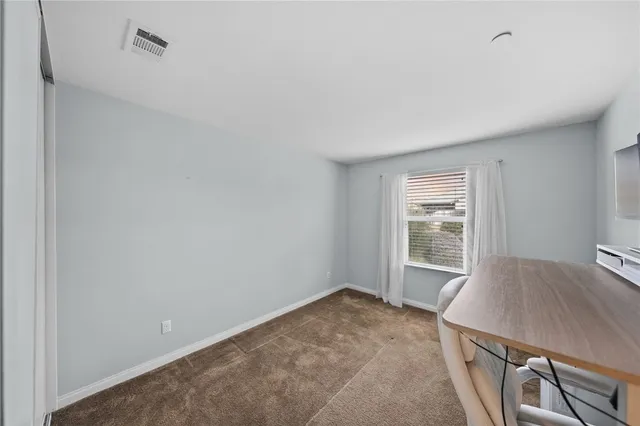 a view of a room with a window