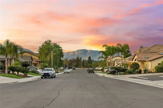 a view of road with houses