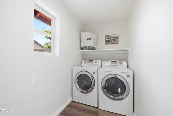 a kitchen with a sink a stove a refrigerator and a sink