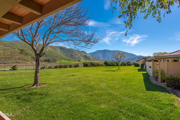 a view of a patio with swimming pool