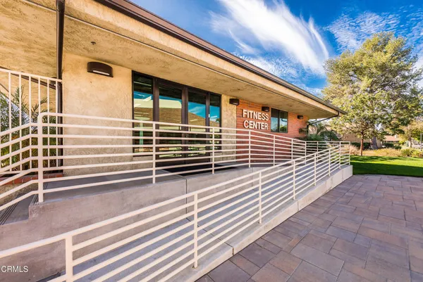 a view of house with outdoor space and entertaining space