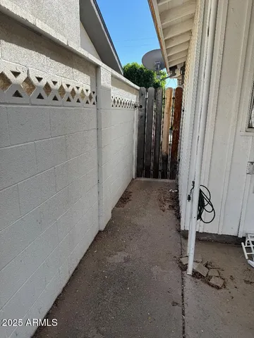 a view of a garage with rack on the wall