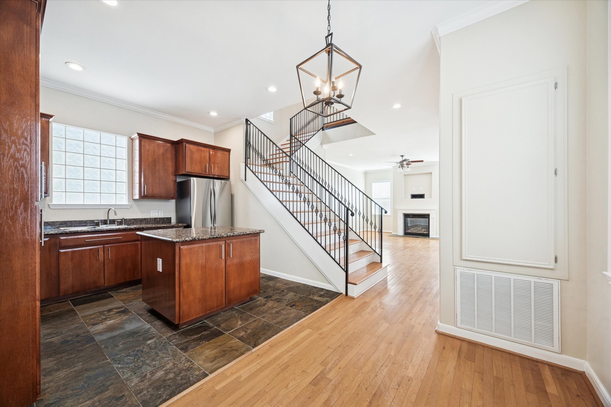 1427 West 25th Street Houston, TX 77008 - Photo 11 of 36 a view of kitchen with sink and wooden floor