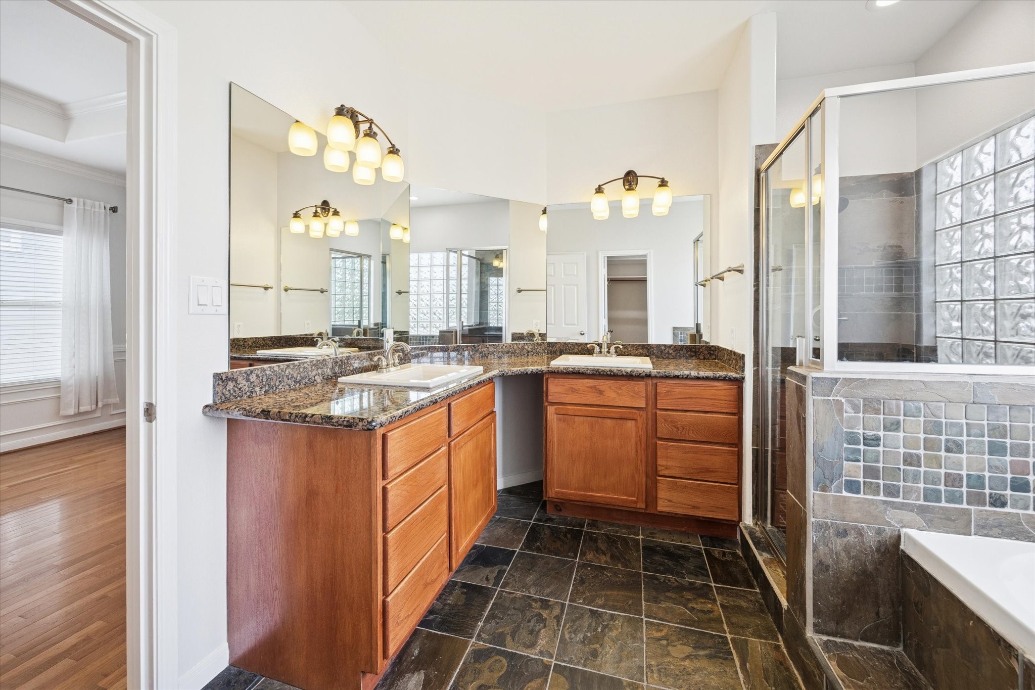 1427 West 25th Street Houston, TX 77008 - Photo 19 of 36 a kitchen with a sink stove and cabinets