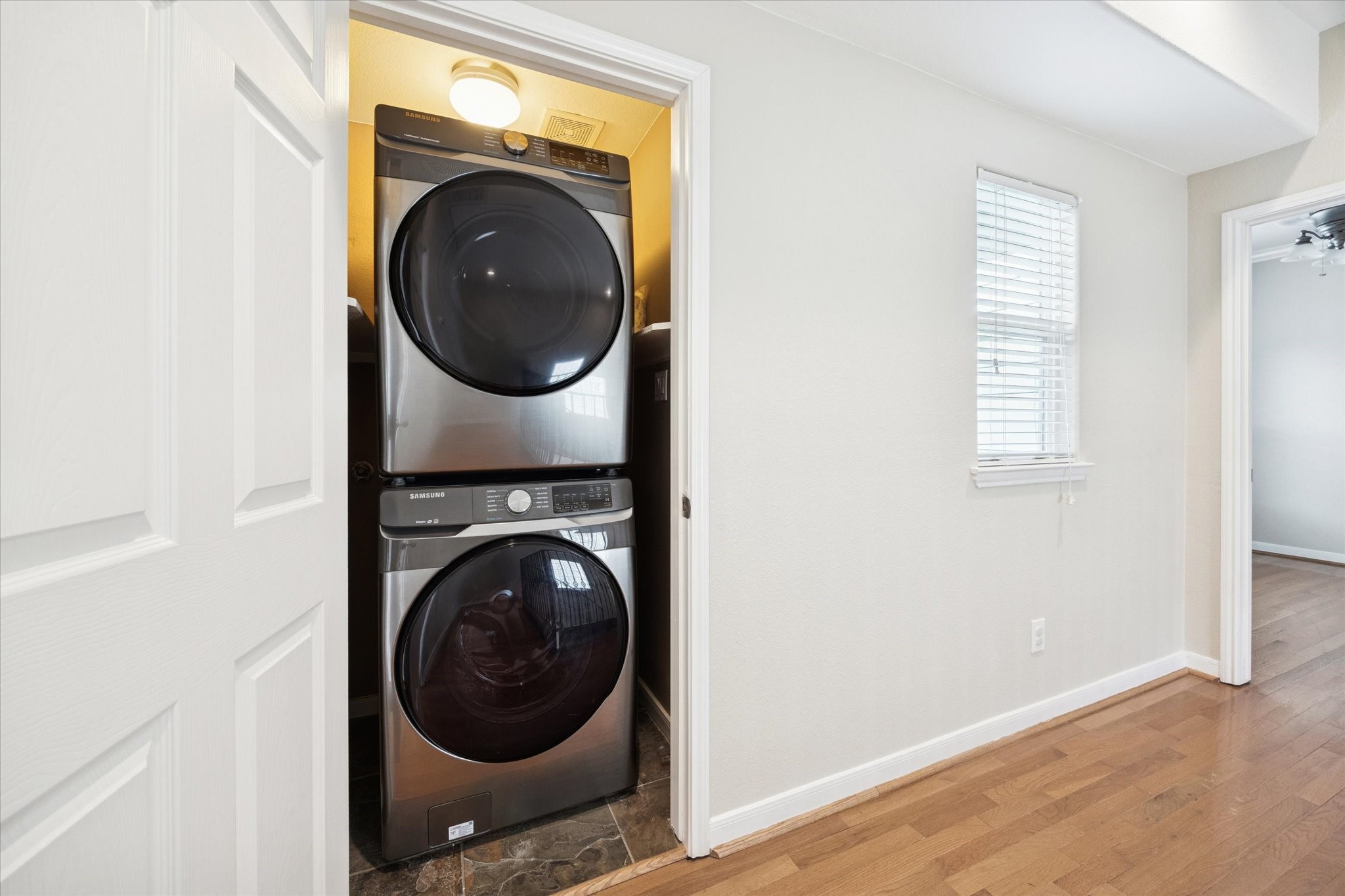 1427 West 25th Street Houston, TX 77008 - Photo 29 of 36 a view of a hallway with washer and dryer