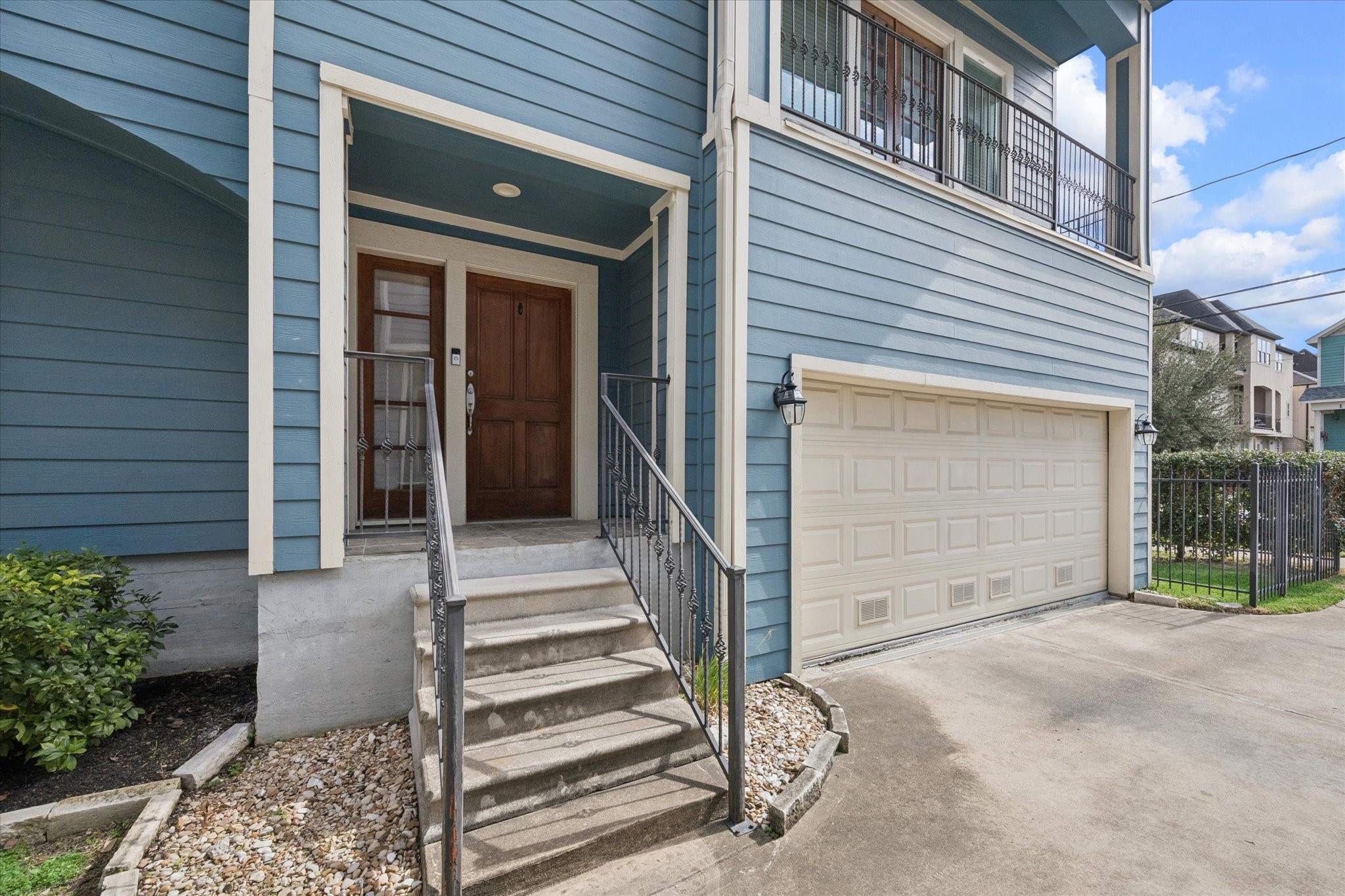 1427 West 25th Street Houston, TX 77008 - Photo 4 of 36 a view of a house with a large window and stairs