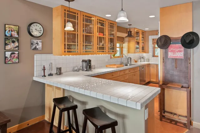 a bathroom with a sink double vanity and a mirror