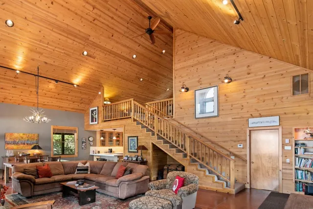 a view of a balcony with wooden floor