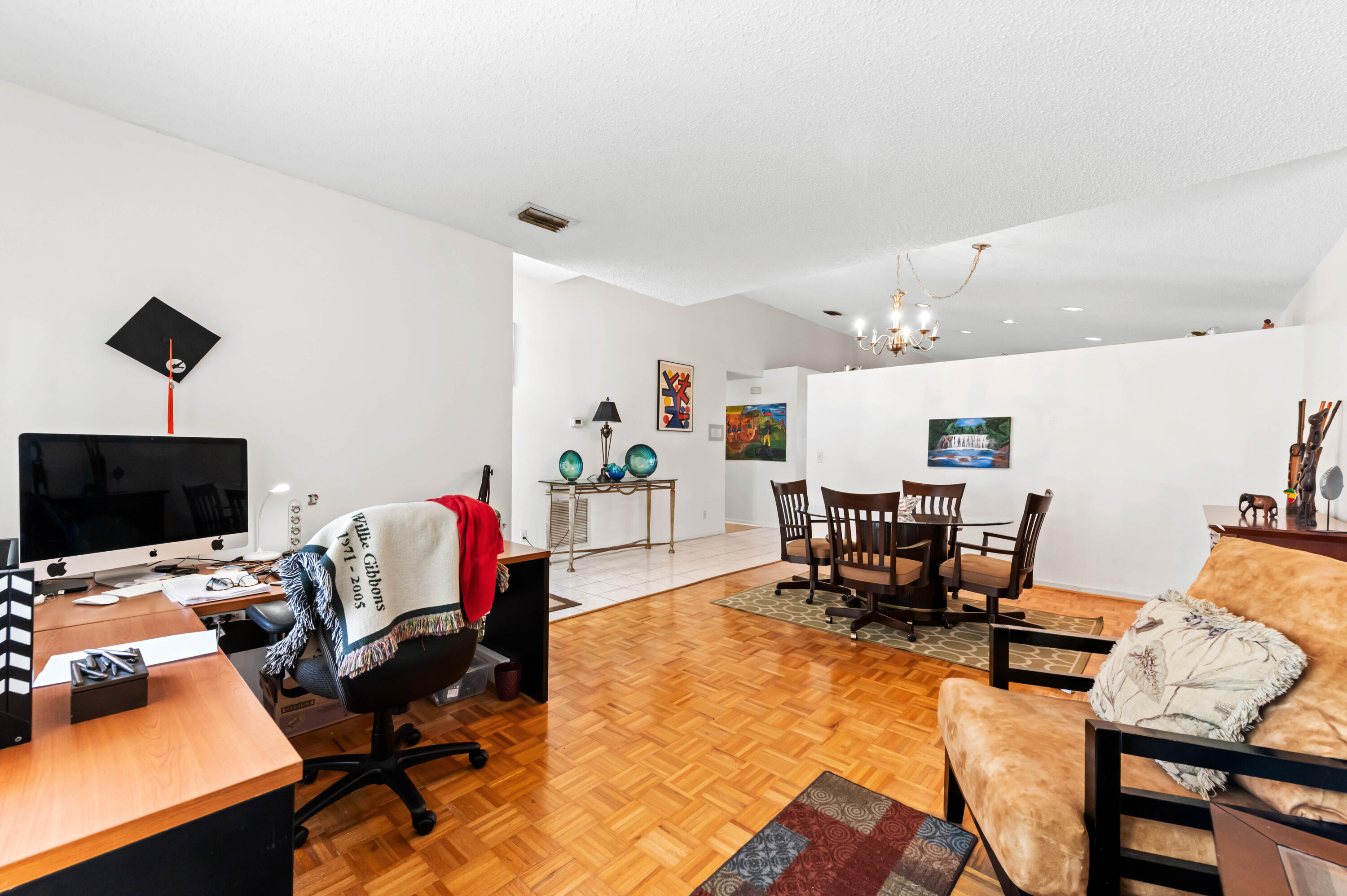 7409 Michigan Isle Road Lake Worth, FL 33467 - Photo 11 of 43 a workspace with furniture