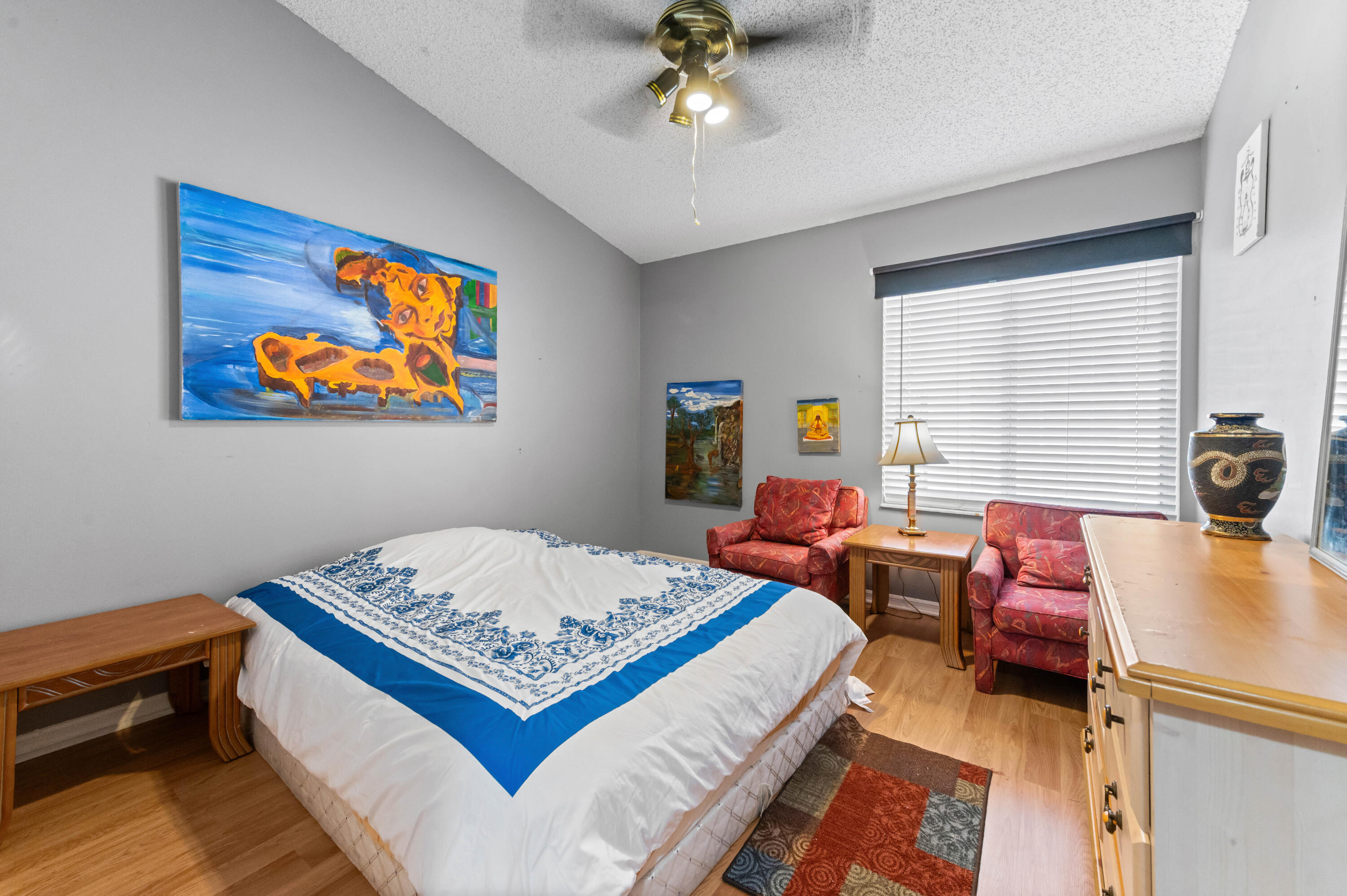 7409 Michigan Isle Road Lake Worth, FL 33467 - Photo 21 of 43 a bedroom with bed and a window