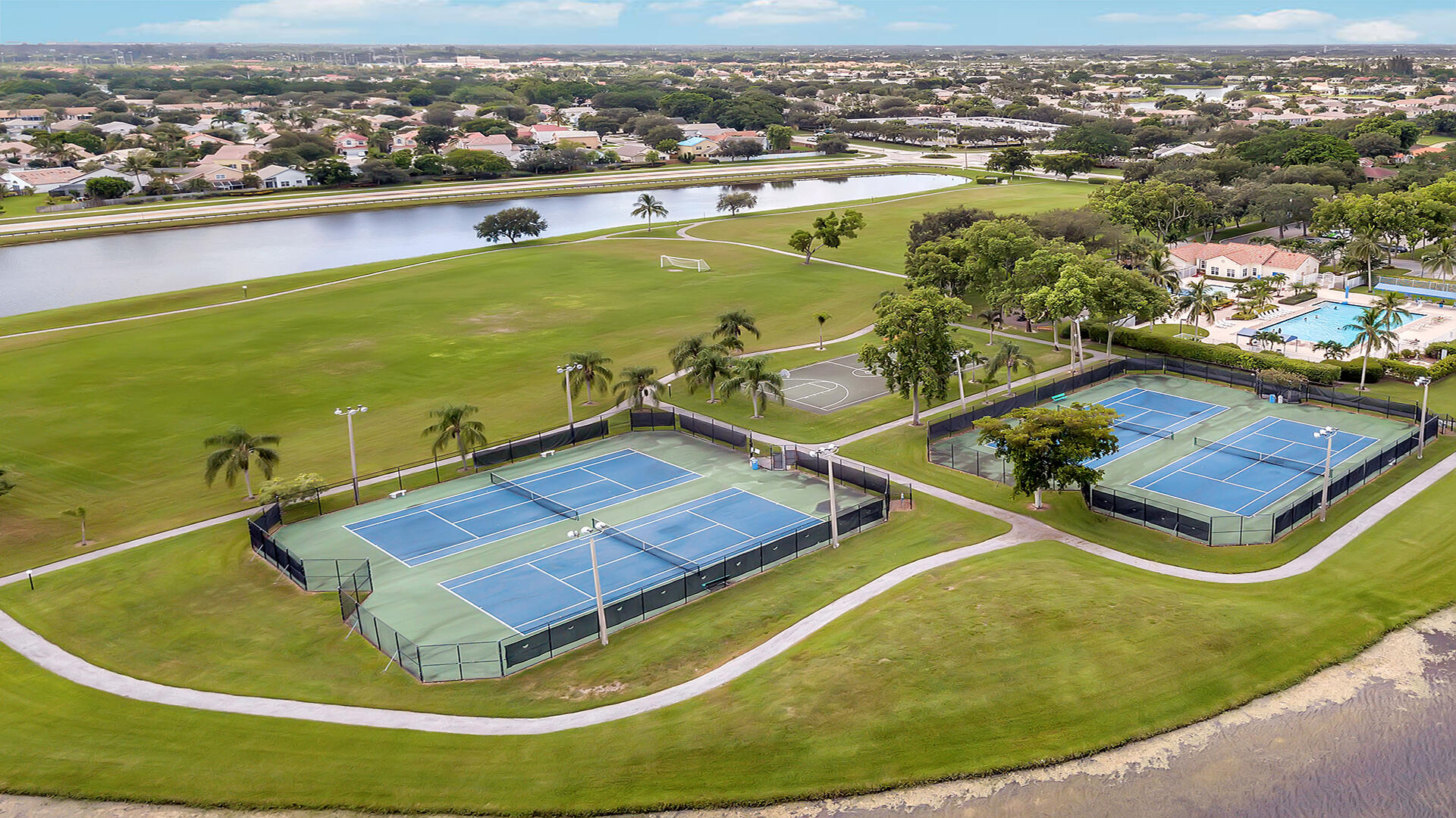 7409 Michigan Isle Road Lake Worth, FL 33467 - Photo 39 of 43 an aerial view of a house with a swimming pool