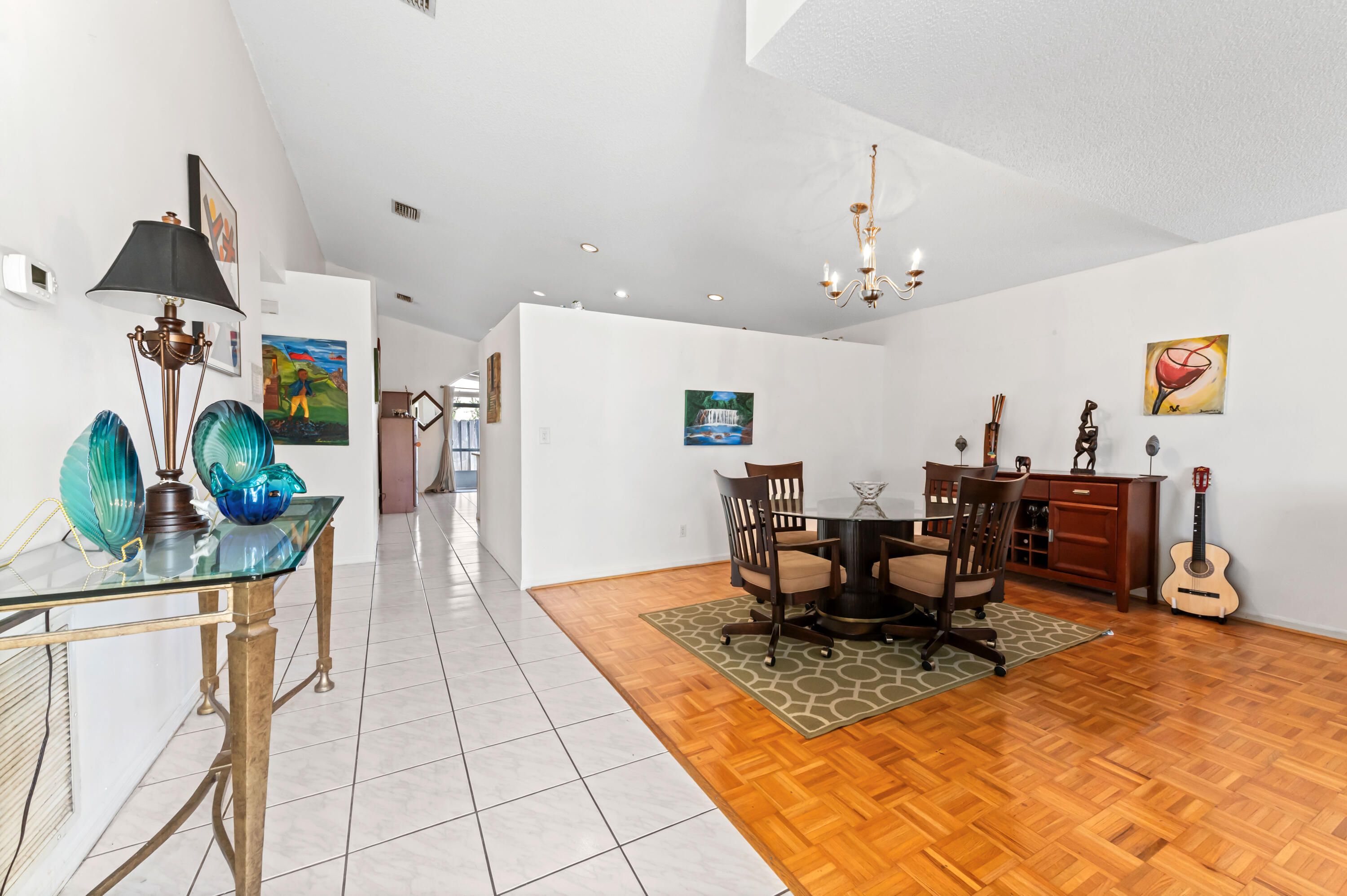 7409 Michigan Isle Road Lake Worth, FL 33467 - Photo 6 of 43 a view of a dining room with furniture