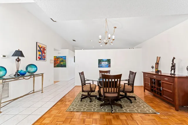 a view of a dining room with furniture