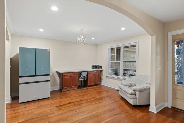 a living room with furniture and windows