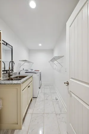 a view of a lake with a house