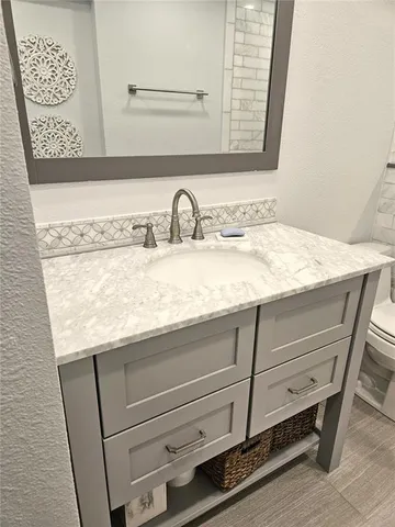 a close view of sink and mirror