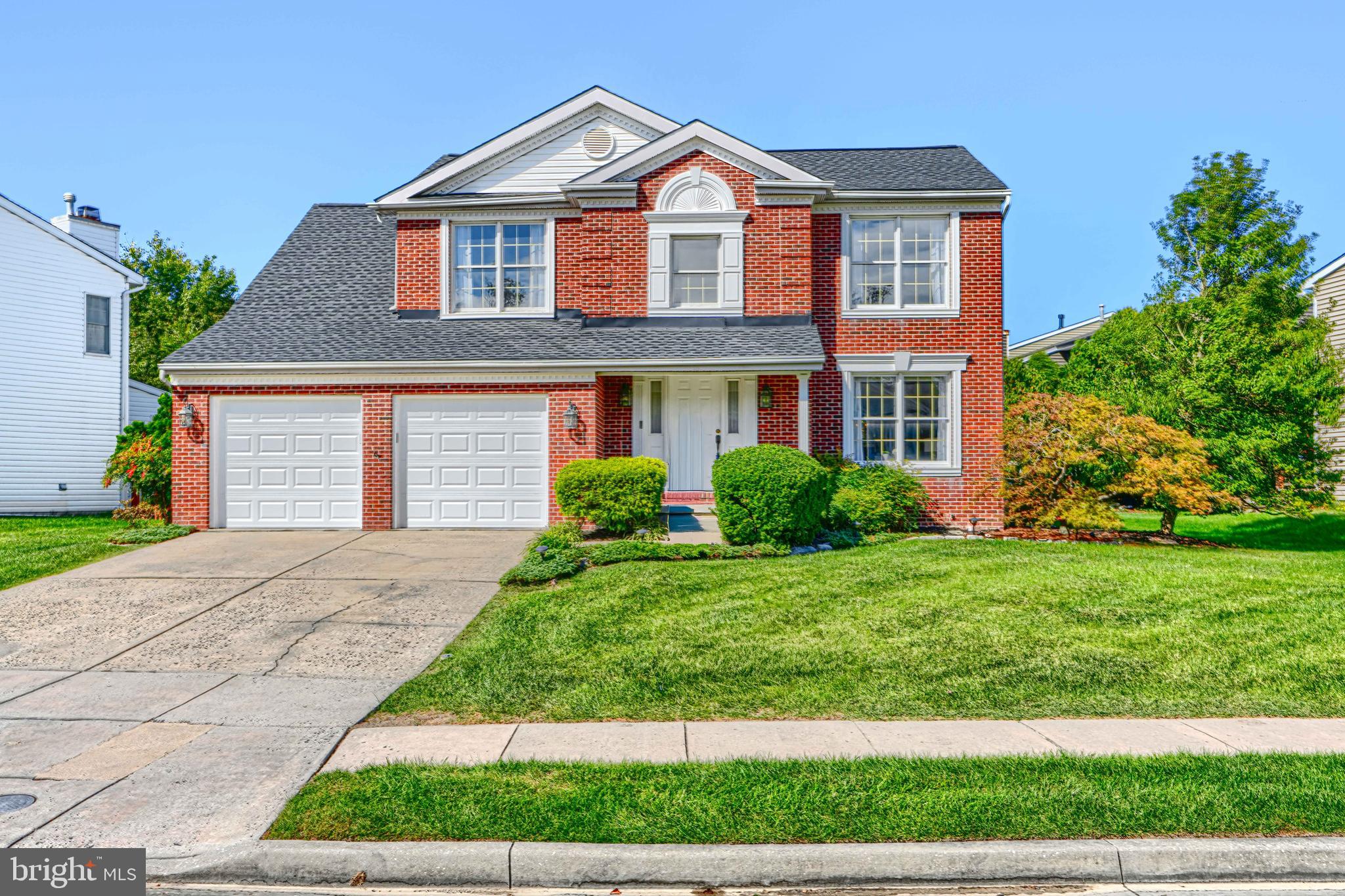 9018 Gardenia Road Baltimore, MD 21236 - Photo 11 of 47 a front view of a house with a yard