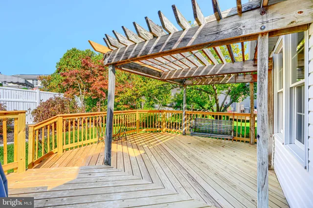 a view of a balcony with wooden floor