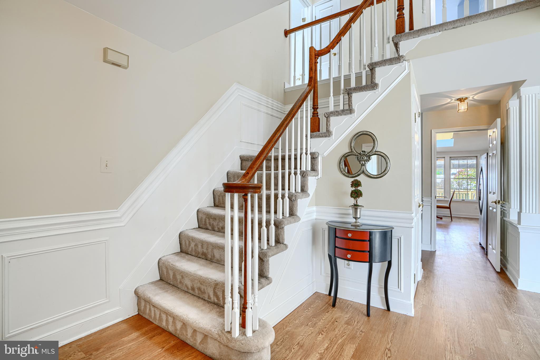 9018 Gardenia Road Baltimore, MD 21236 - Photo 17 of 47 a view of entryway and hall with wooden floor