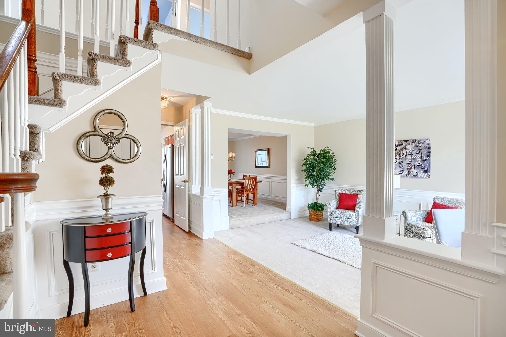 9018 Gardenia Road Baltimore, MD 21236 - Photo 2 of 47 a living room with furniture and a clock
