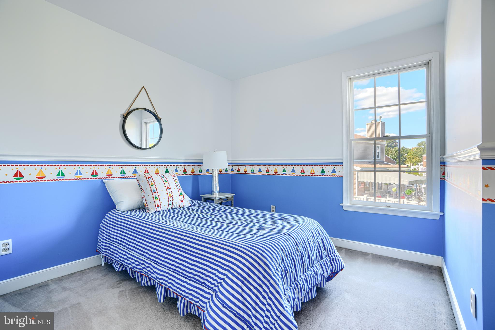 9018 Gardenia Road Baltimore, MD 21236 - Photo 34 of 47 a bedroom with a bed and a window