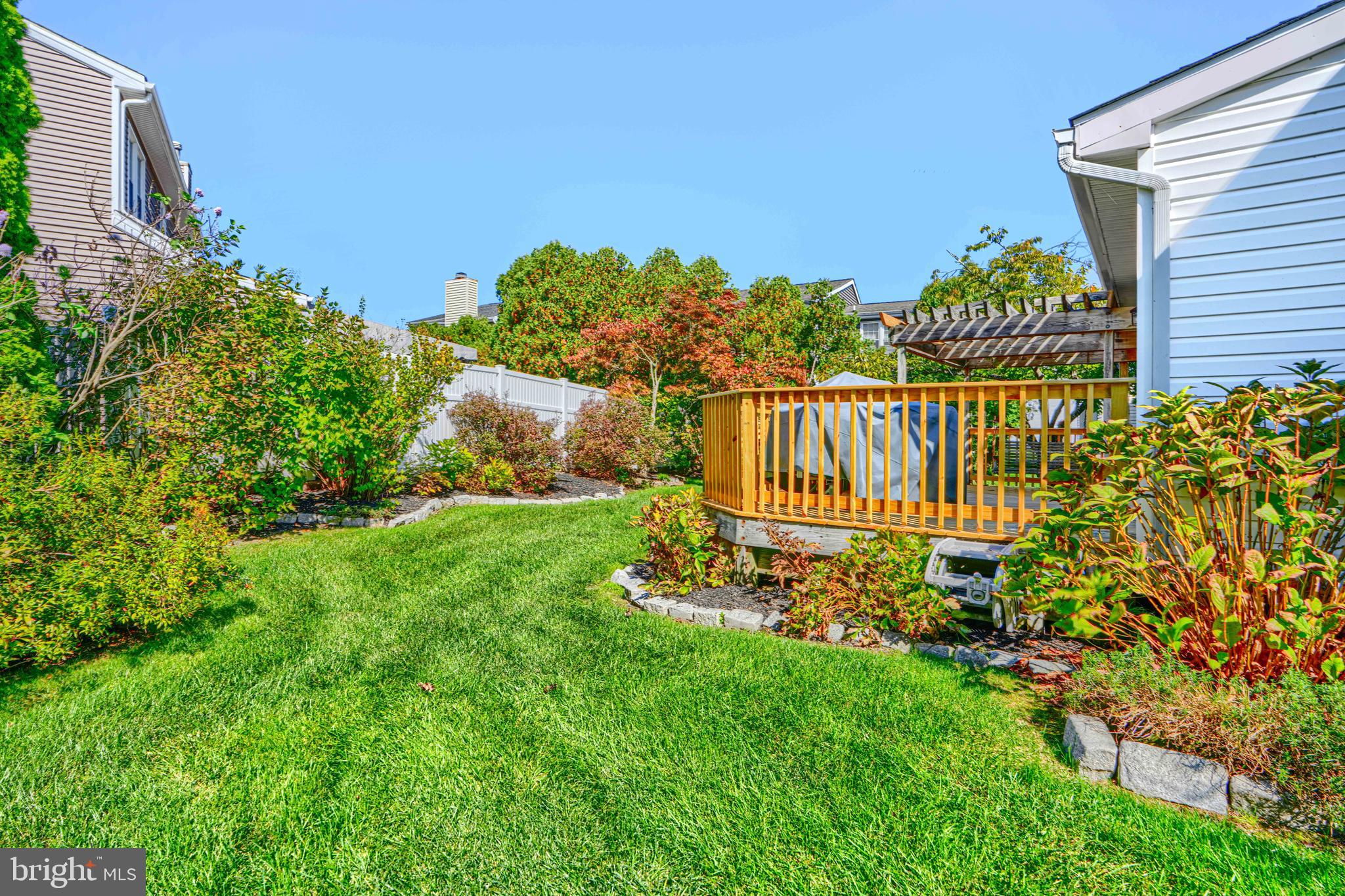 9018 Gardenia Road Baltimore, MD 21236 - Photo 43 of 47 a view of a chair and table in the garden
