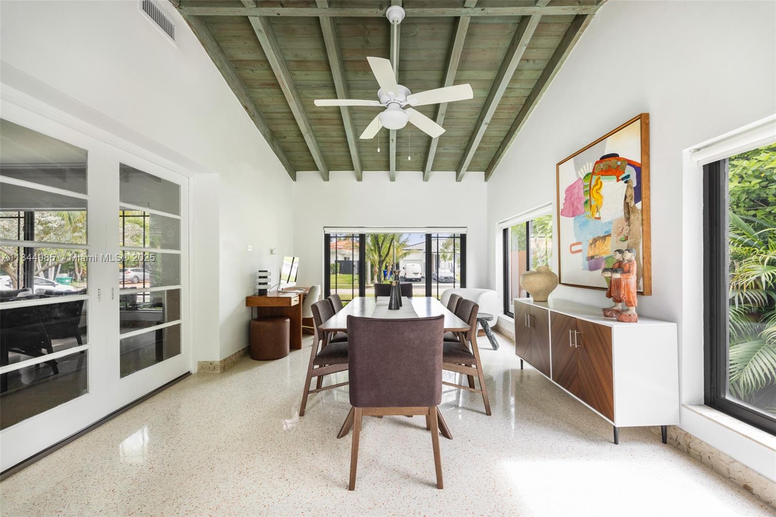 1080 Northeast 86th Street Miami, FL 33138 - Photo 16 of 25 a view of a dining room with furniture window and outside view