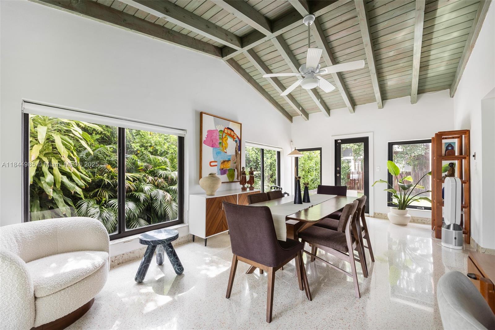 1080 Northeast 86th Street Miami, FL 33138 - Photo 18 of 25 a view of a livingroom with furniture window and outside view