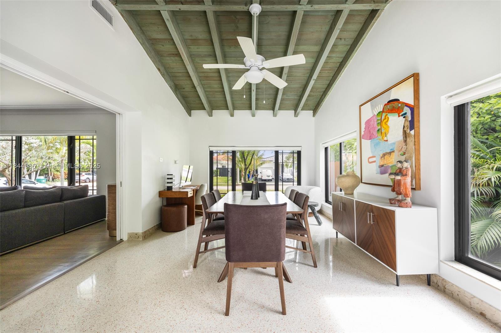 1080 Northeast 86th Street Miami, FL 33138 - Photo 4 of 25 a view of a dining room with furniture window and outside view