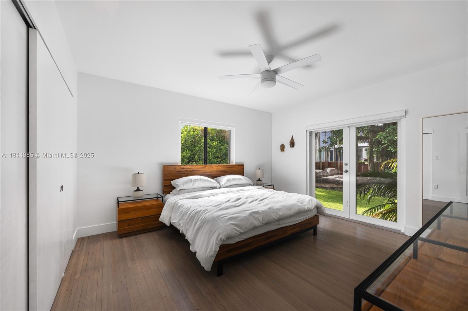 1080 Northeast 86th Street Miami, FL 33138 - Photo 5 of 25 a bedroom with a bed and a window