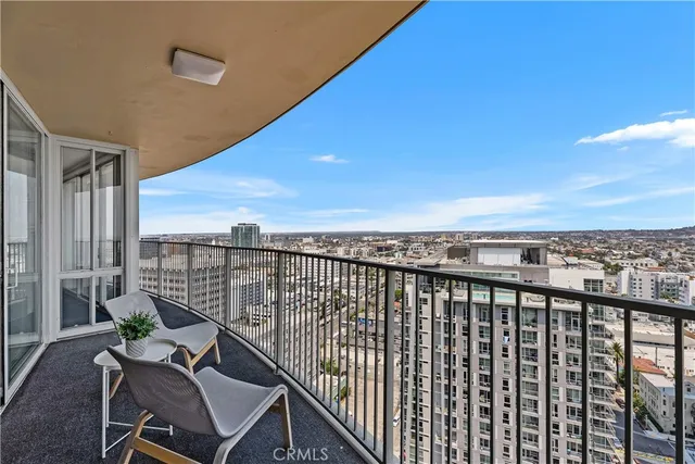 a view of a balcony with city view