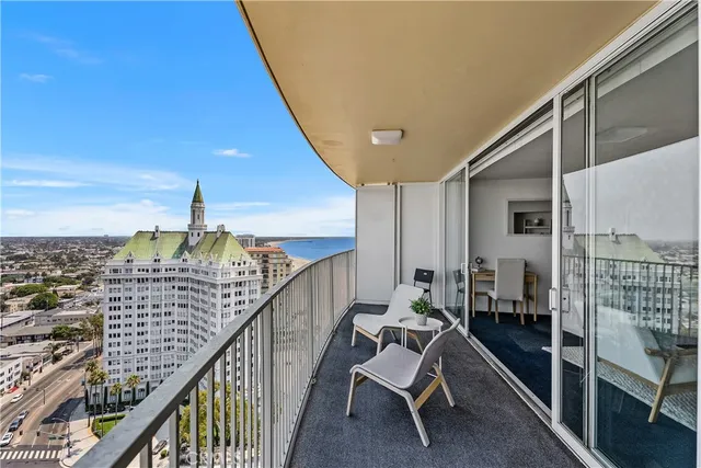 a view of a balcony with city view