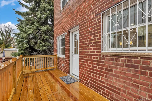 a view of a brick building from a balcony