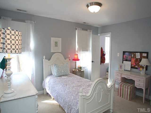 2809 Dray Court Raleigh, NC 27613 - Photo 8 of 13 Another gorgeous and spacious secondary bedroom with plenty of natural light and walk in closet!