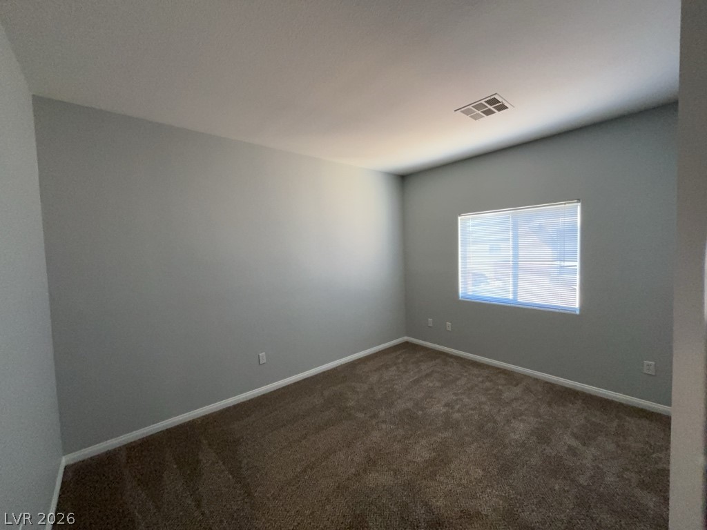 4915 East Russell Road, Unit 133 Las Vegas, NV 89120 - Photo 5 of 10 A well-proportioned room with plush carpeting offers a neutral canvas for personalization.