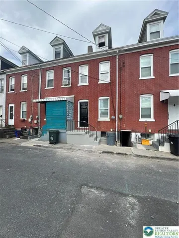 a front view of a building with street