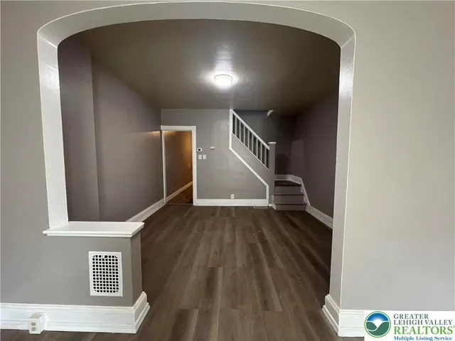 a view of entryway with wooden floor