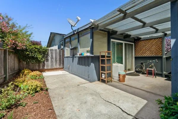 a view of a chairs and tables in patio
