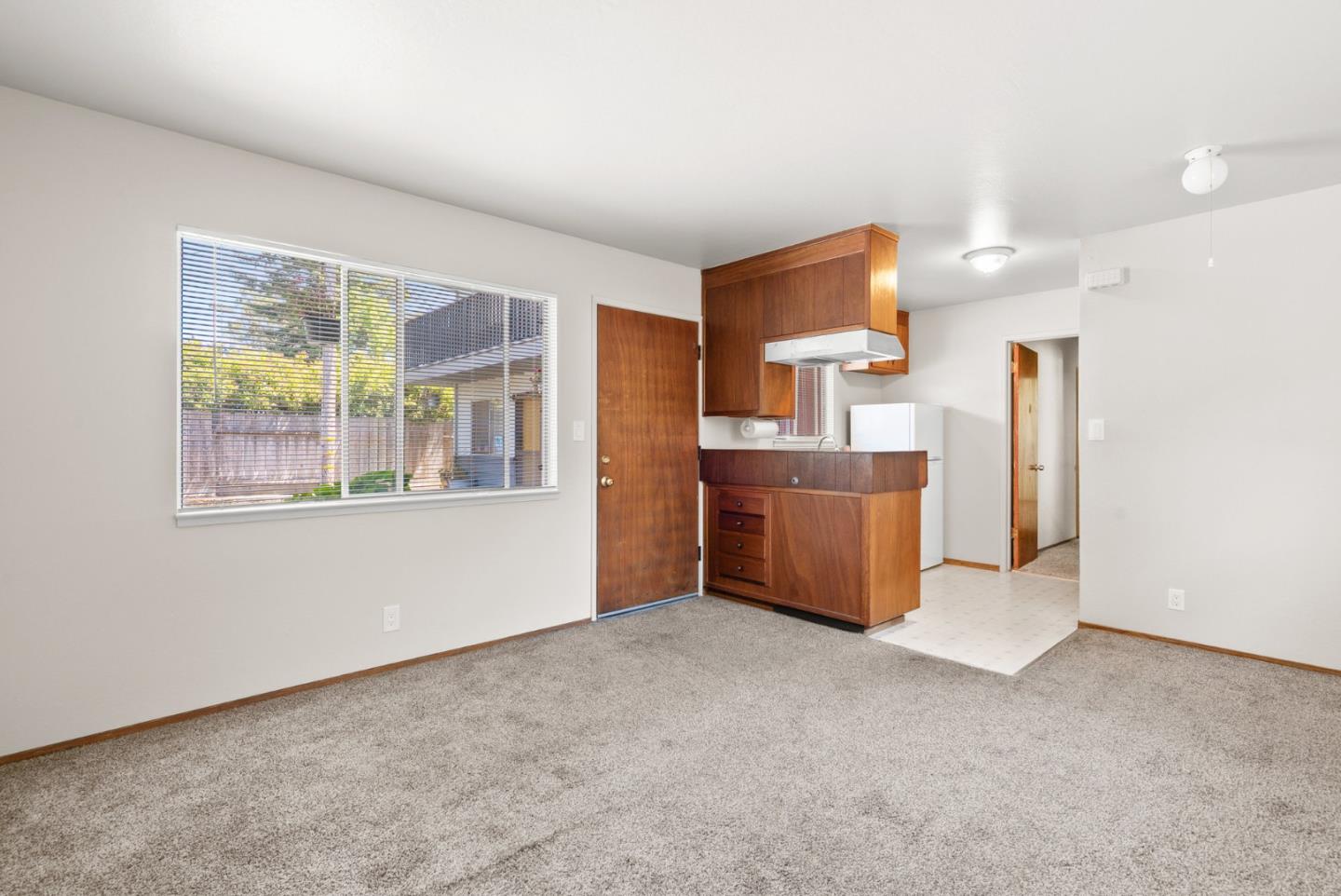 1450 Merrill Street Santa Cruz, CA 95062 - Photo 16 of 21 a big room with a cabinet and a window