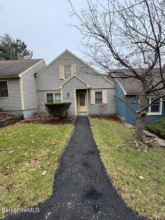 a front view of house with yard