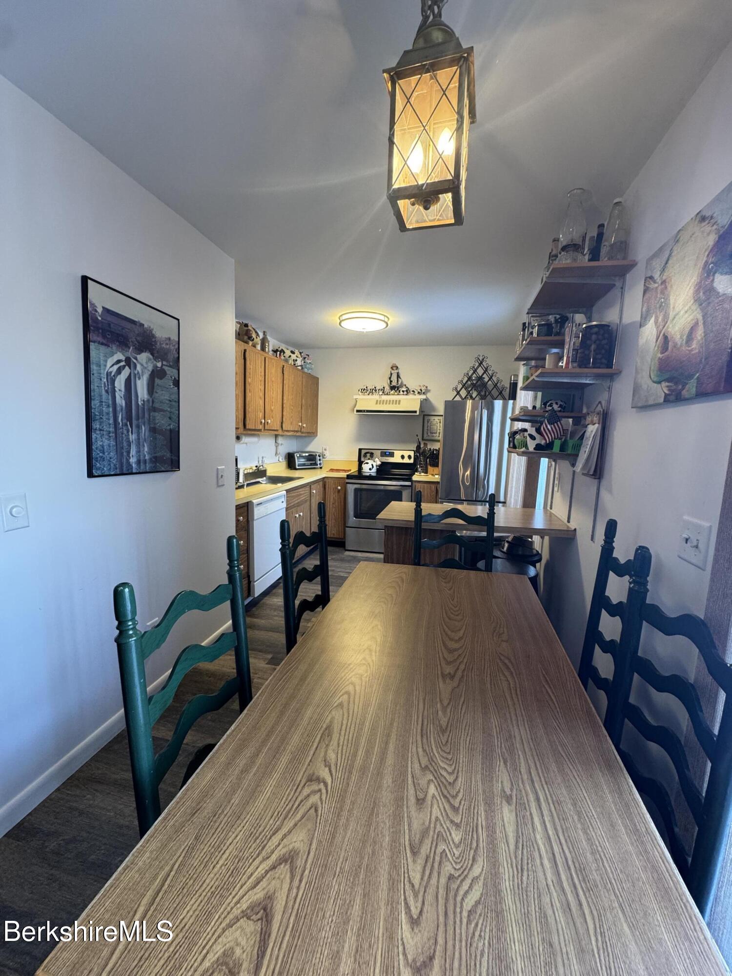 37 Corey Road, Unit 14 Hancock, MA 01237 - Photo 12 of 30 a living room with furniture and a flat screen tv
